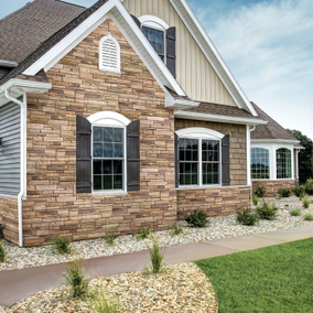 Home featuring Versetta Stone ledgestone in the color Plum Creek